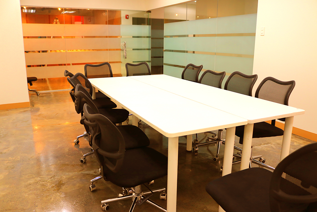 Clock In by Ayala Land Offices — Bonifacio High Street workspace view 2